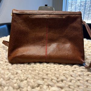 This bag is really nice just too small for me it had to outside pockets